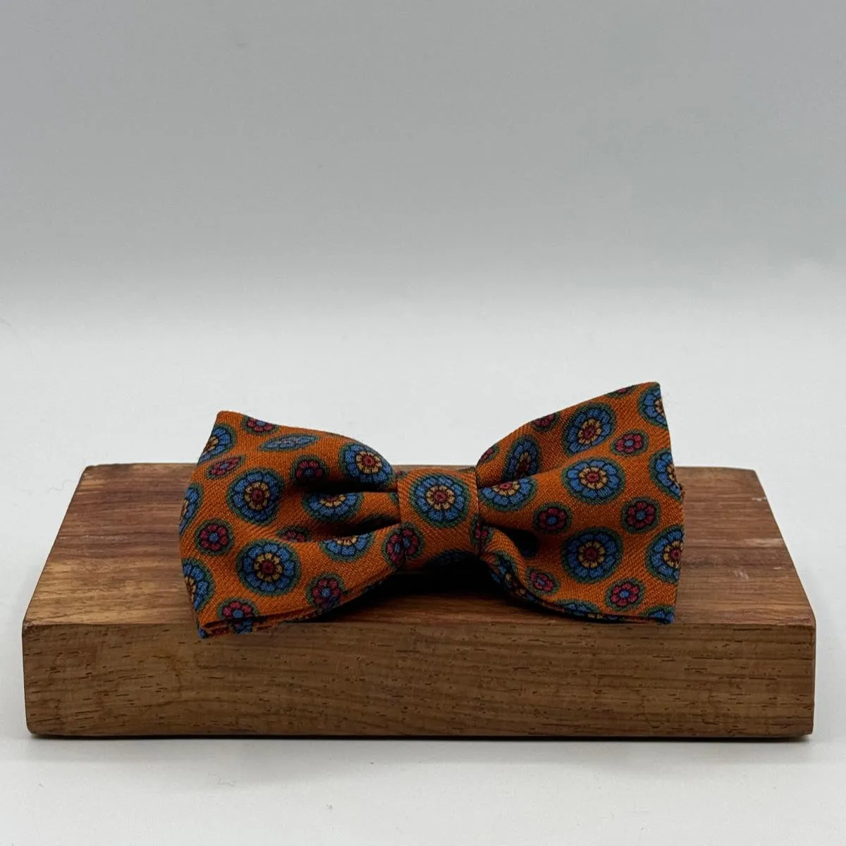 Cruciani & Bella Bow Ties - Printed Silk and Wool  - Rust, Light Blue, Red and Yellow  motif#8787